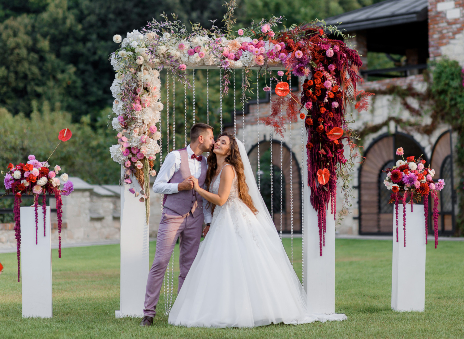 wedding-archway-backyard-happy-wedding-couple-outdoors-before-wedding-ceremony